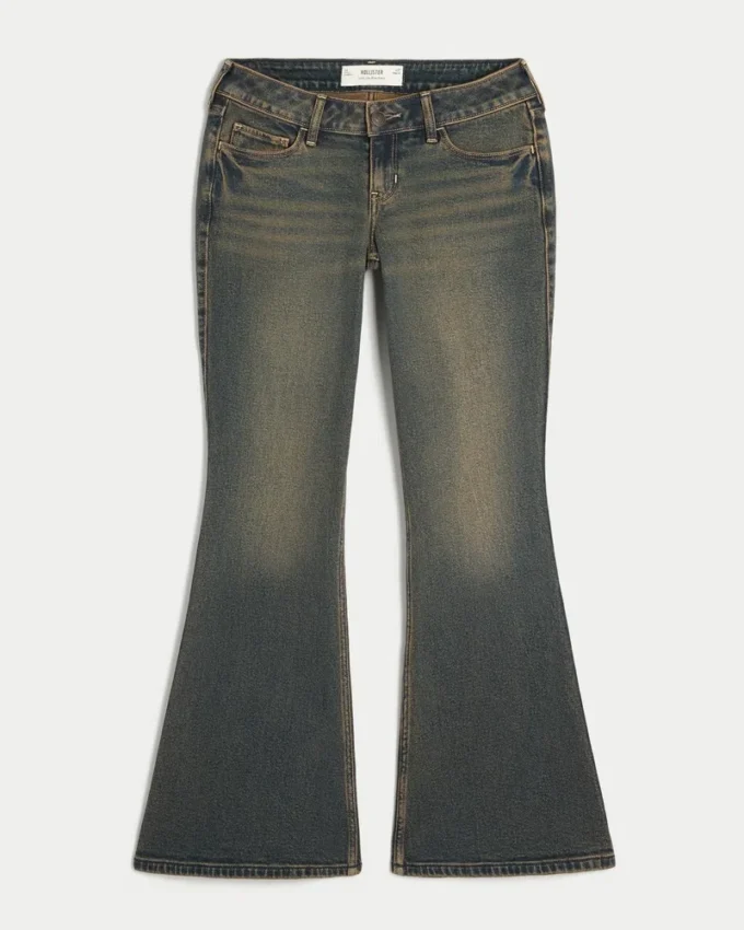 Ultra låg midja, mörk tvätt, utsvängda jeans Ultra låg midja, mörk tvätt, utsvängda jeans