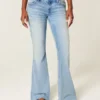 Ultra låg midja, slitna, ljus tvättade jeans med paljetter Ultra låg midja, slitna, ljus tvättade jeans med paljetter
