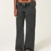 Ultra låg midja, tvättad svart baggy jeans med spänne bak Ultra låg midja, tvättad svart baggy jeans med spänne bak