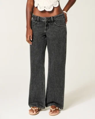 Ultra låg midja, tvättad svart baggy jeans med spänne bak