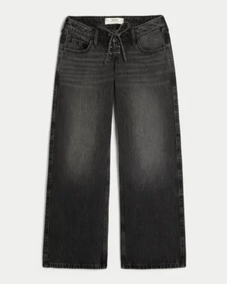 Ultra låg midja, tvättade svarta baggy jeans med snörning