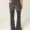 Ultra låg midja, tvättade svarta flare-jeans Ultra låg midja, tvättade svarta flare-jeans