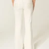 Ultra låg midja vita broderade fickor flare jeans Ultra låg midja vita broderade fickor flare jeans