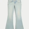 Ultralåga, ljus tvättade jeans med nedhasad fåll och utsvängda ben Ultralåga, ljus tvättade jeans med nedhasad fåll och utsvängda ben