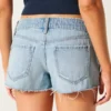 Ultralåga slitna minishorts i mediumtvättad denim