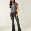 Ultralåga, svarta flare-jeans med blommig brodyr Ultralåga, svarta flare-jeans med blommig brodyr