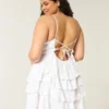 V-ringad babydoll-miniklänning med volanger