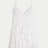 V-ringad babydoll-miniklänning med volanger